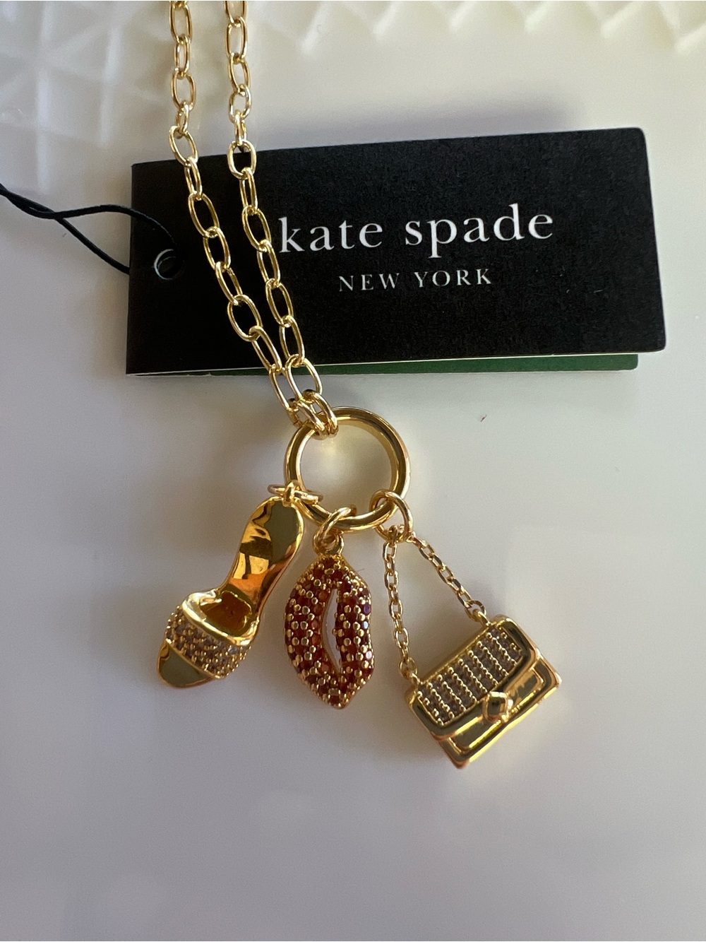 kate spade charm necklace with lip, shoe & purse charms 21” inches long